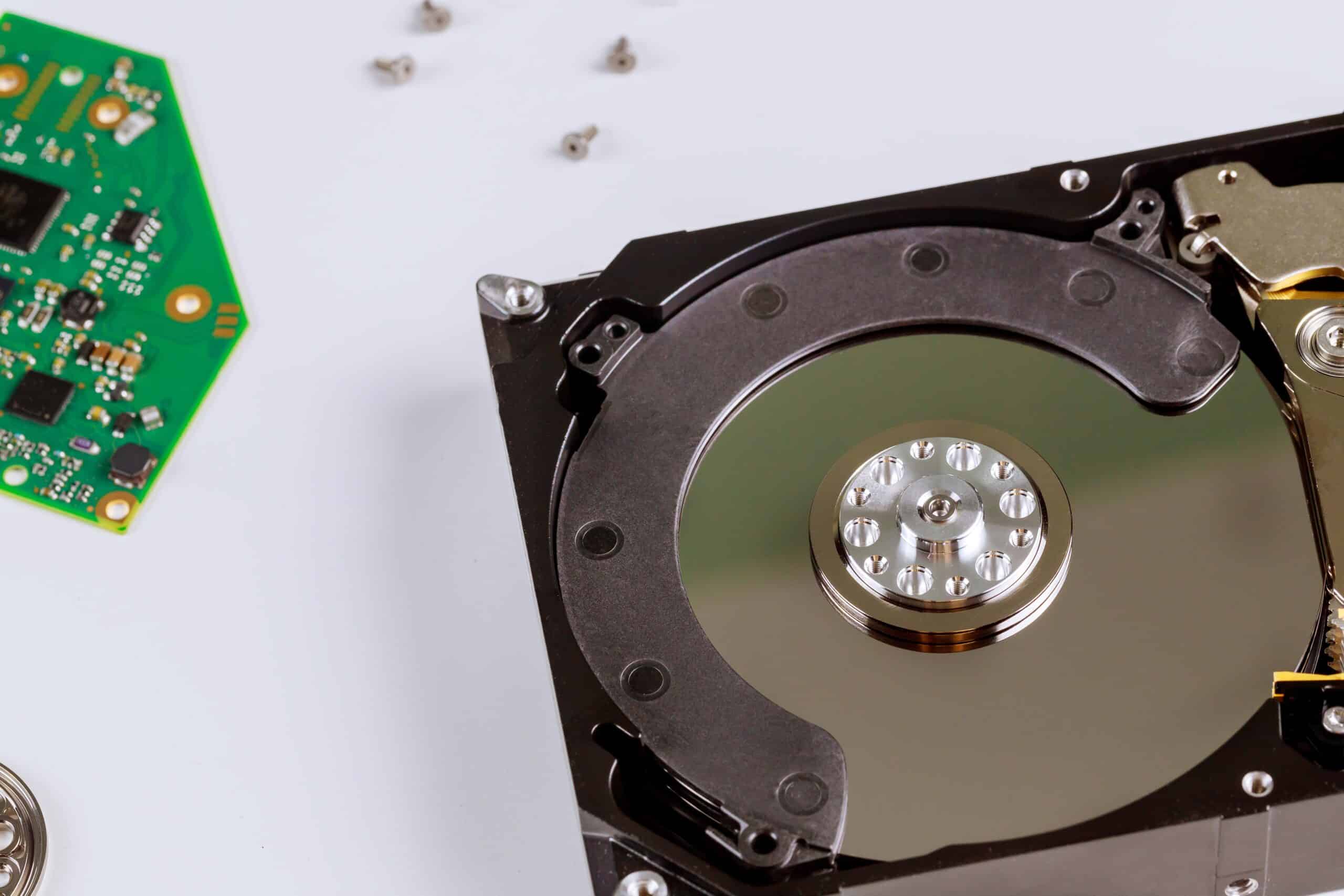 Disassembled hard drive disk from the computer